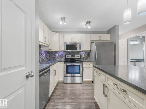 29 4029 Orchards Drive, Edmonton, AB - Indoor Photo Showing Kitchen With Stainless Steel Kitchen With Upgraded Kitchen