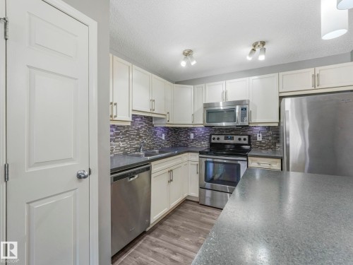 29 4029 Orchards Drive, Edmonton, AB - Indoor Photo Showing Kitchen With Stainless Steel Kitchen With Upgraded Kitchen