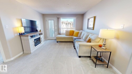 1302 9363 Simpson Drive, Edmonton, AB - Indoor Photo Showing Living Room