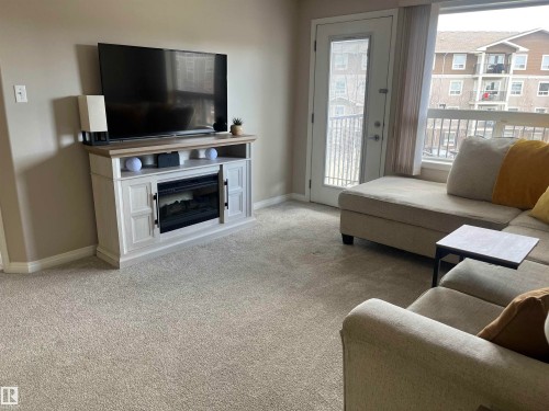 1302 9363 Simpson Drive, Edmonton, AB - Indoor Photo Showing Living Room