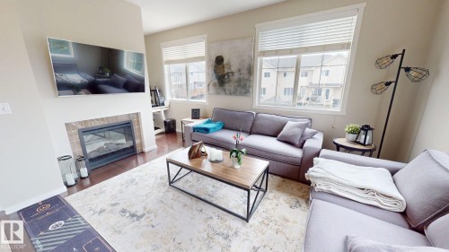 105 603 Watt Boulevard, Edmonton, AB - Indoor Photo Showing Living Room With Fireplace