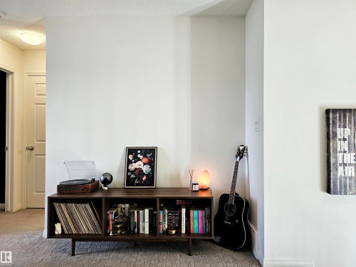 Interior space featuring light-colored walls and carpeted flooring - 6888 Evans Wynd, Edmonton, AB - Indoor