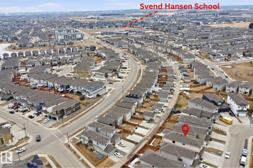 Aerial view showcasing the residential neighbourhood and its proximity to Svend Hansen School - 2420 13 Avenue, Edmonton, AB -  With View
