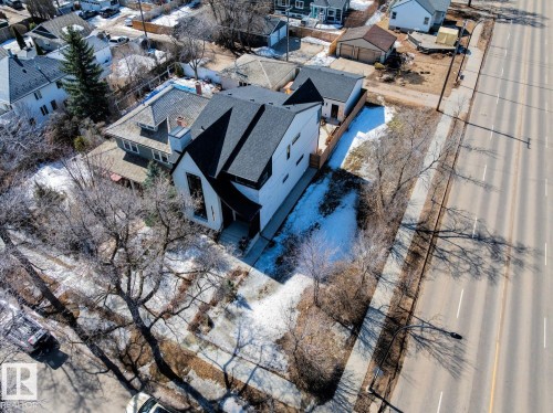 The property features a contemporary architectural style with a dark-pitched roof and light-colored siding - 11146 62 Street Nw, Edmonton, AB - Outdoor With View