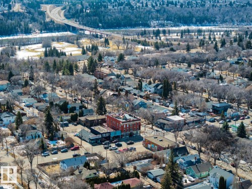 Aerial view of the neighborhood featuring a variety of properties, including residential homes and commercial buildings - 11146 62 Street Nw, Edmonton, AB - Outdoor With View