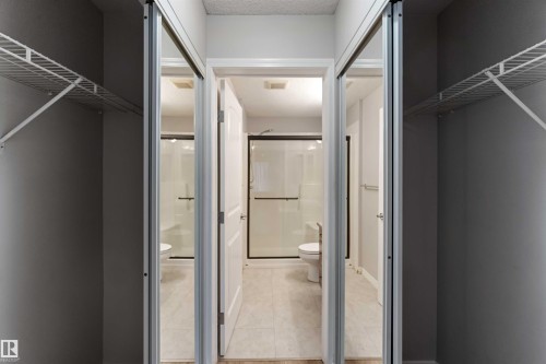 The property features spacious closets with wire shelving, offering ample storage - 319 17415 99 Avenue, Edmonton, AB - Indoor