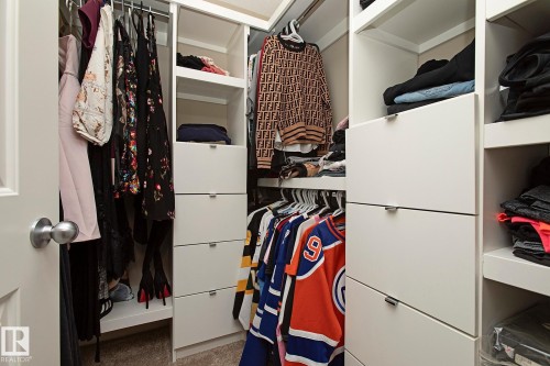 This property features a walk-in closet with built-in storage solutions, including shelving units and drawers - 7718 Eifert Crescent, Edmonton, AB - Indoor With Storage