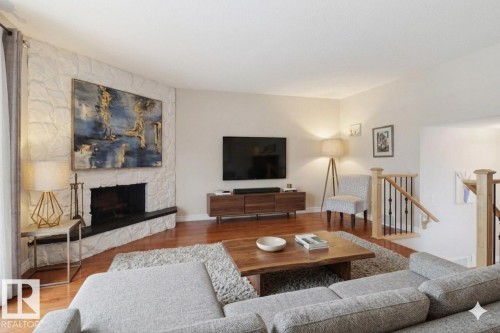9023 95 Street, Edmonton, AB - Indoor Photo Showing Living Room With Fireplace