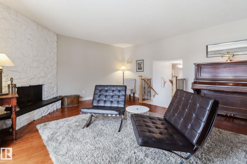 9023 95 Street, Edmonton, AB - Indoor Photo Showing Living Room With Fireplace