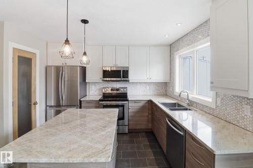 9023 95 Street, Edmonton, AB - Indoor Photo Showing Kitchen With Double Sink With Upgraded Kitchen