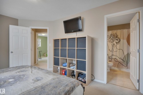 The room features neutral-toned walls and carpeted flooring - 5 Parkview Crescent, Calmar, AB - Indoor Photo Showing Bedroom
