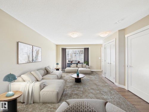32 2121 Haddow Drive, Edmonton, AB - Indoor Photo Showing Living Room