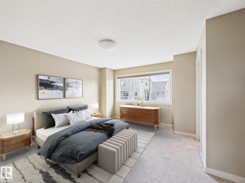 32 2121 Haddow Drive, Edmonton, AB - Indoor Photo Showing Bedroom