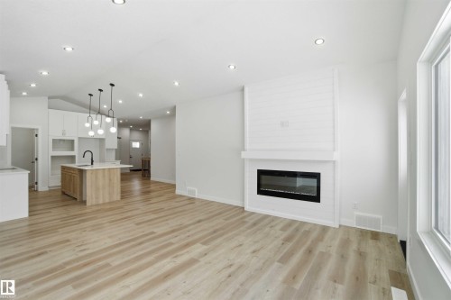 3320 Chickadee Drive, Edmonton, AB - Indoor Photo Showing Other Room With Fireplace