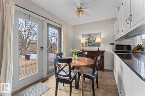 This room features light-colored walls and a ceiling fan - 4003 50A Avenue, Cold Lake, AB - Indoor Photo Showing Dining Room