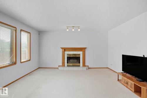 15535 70 Street, Edmonton, AB - Indoor Photo Showing Living Room With Fireplace