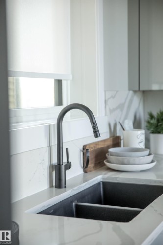 15807 30 Avenue, Edmonton, AB - Indoor Photo Showing Kitchen With Double Sink