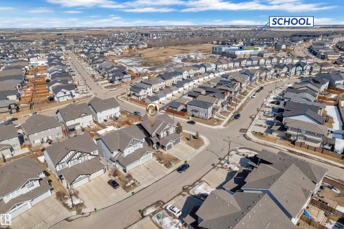 Aerial view of the property and the surrounding neighbourhood, showcasing the proximity to the school - 6406 169 Avenue, Edmonton, AB - Outdoor With View