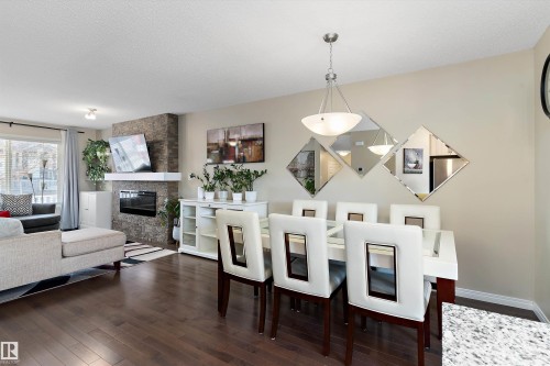 4026 Orchards Drive, Edmonton, AB - Indoor Photo Showing Living Room With Fireplace