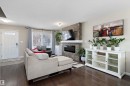 4026 Orchards Drive, Edmonton, AB  - Indoor Photo Showing Living Room With Fireplace 