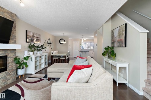 4026 Orchards Drive, Edmonton, AB - Indoor Photo Showing Living Room With Fireplace