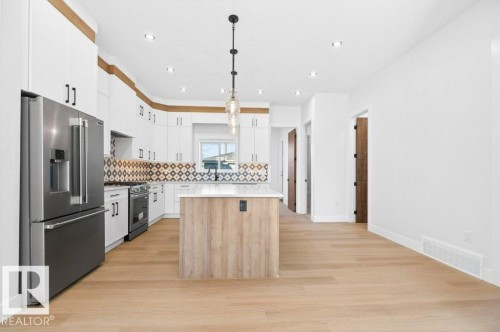 8506 148 Street Nw, Edmonton, AB - Indoor Photo Showing Kitchen With Stainless Steel Kitchen With Upgraded Kitchen