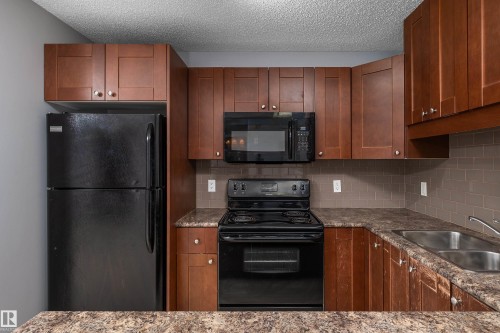 405 10535 122 Street, Edmonton, AB - Indoor Photo Showing Kitchen With Double Sink