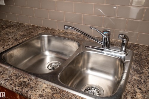 405 10535 122 Street, Edmonton, AB - Indoor Photo Showing Kitchen With Double Sink
