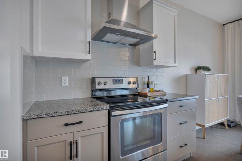 8945 24 Avenue, Edmonton, AB - Indoor Photo Showing Kitchen With Upgraded Kitchen