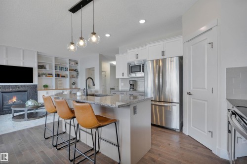 8945 24 Avenue, Edmonton, AB - Indoor Photo Showing Kitchen With Stainless Steel Kitchen With Upgraded Kitchen