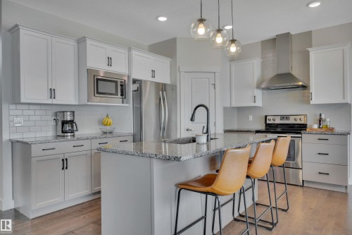 8945 24 Avenue, Edmonton, AB - Indoor Photo Showing Kitchen With Stainless Steel Kitchen With Upgraded Kitchen