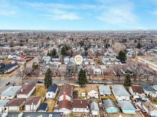 Aerial view showcasing the residential neighbourhood with a variety of detached properties - 12141 96 Street, Edmonton, AB - Outdoor With View