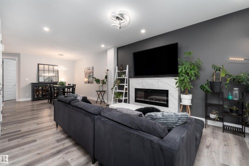9338 Pear Link, Edmonton, AB - Indoor Photo Showing Living Room With Fireplace