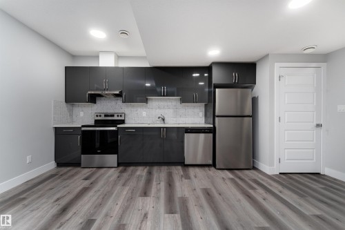 9338 Pear Link, Edmonton, AB - Indoor Photo Showing Kitchen With Stainless Steel Kitchen With Upgraded Kitchen