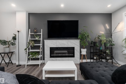 9338 Pear Link, Edmonton, AB - Indoor Photo Showing Living Room With Fireplace