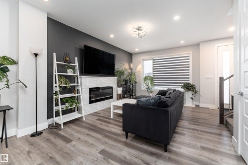9338 Pear Link, Edmonton, AB - Indoor Photo Showing Living Room With Fireplace