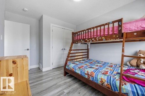 This room features light grey walls, light-toned flooring, and white interior doors - 17534 60A Street, Edmonton, AB - Indoor Photo Showing Bedroom