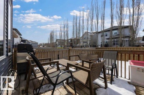 The property includes a spacious wooden deck, ideal for outdoor gatherings - 17534 60A Street, Edmonton, AB - Outdoor With Deck Patio Veranda