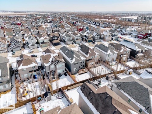 Aerial view of a residential area with numerous detached properties, each featuring a private yard - 17534 60A Street, Edmonton, AB - Outdoor With View