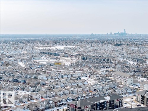 Aerial view of a residential neighbourhood with a cityscape visible in the distance - 17534 60A Street, Edmonton, AB - Outdoor With View