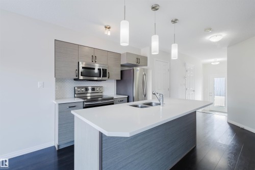 2082 Price Landing, Edmonton, AB - Indoor Photo Showing Kitchen With Stainless Steel Kitchen With Double Sink With Upgraded Kitchen