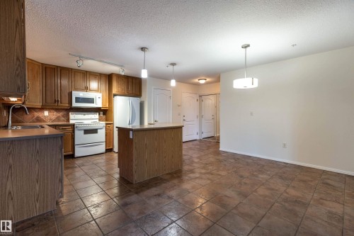 105 8912 156 Street, Edmonton, AB - Indoor Photo Showing Kitchen With Double Sink