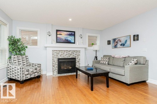 17 Cranberry Bend, Fort Saskatchewan, AB - Indoor Photo Showing Living Room With Fireplace