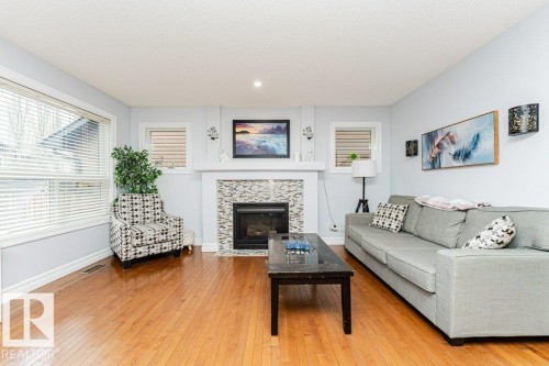 17 Cranberry Bend, Fort Saskatchewan, AB - Indoor Photo Showing Living Room With Fireplace