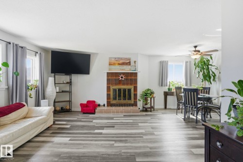 12340 St Albert Trail, Edmonton, AB - Indoor Photo Showing Living Room With Fireplace