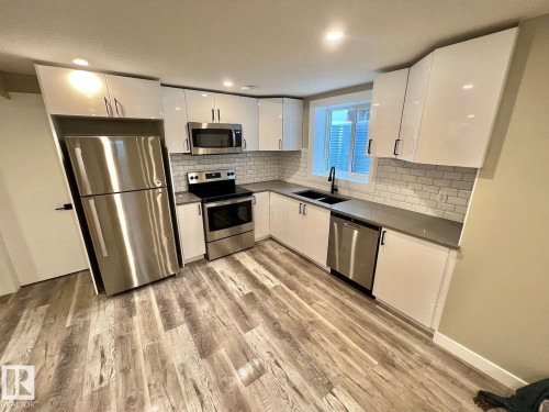 4 Eagle Drive, Sherwood Park, AB - Indoor Photo Showing Kitchen With Double Sink