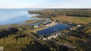Aerial view of the property and its surrounding area - 17 Sunset Harbour, Rural Wetaskiwin County, AB  - Outdoor With Body Of Water With View 