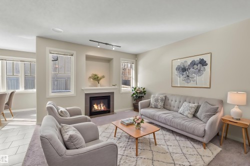 805 Armitage Wynd, Edmonton, AB - Indoor Photo Showing Living Room With Fireplace