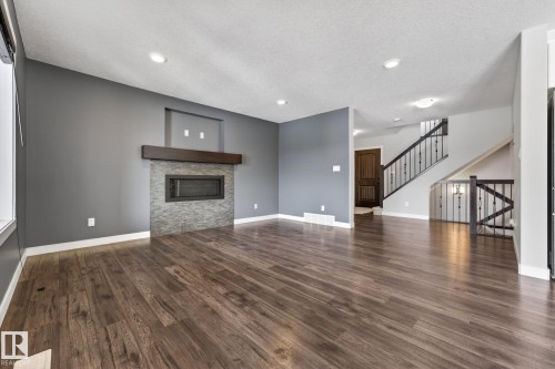 433 Meadowview Drive, Fort Saskatchewan, AB - Indoor Photo Showing Living Room With Fireplace