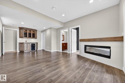 433 Meadowview Drive, Fort Saskatchewan, AB - Indoor Photo Showing Living Room With Fireplace